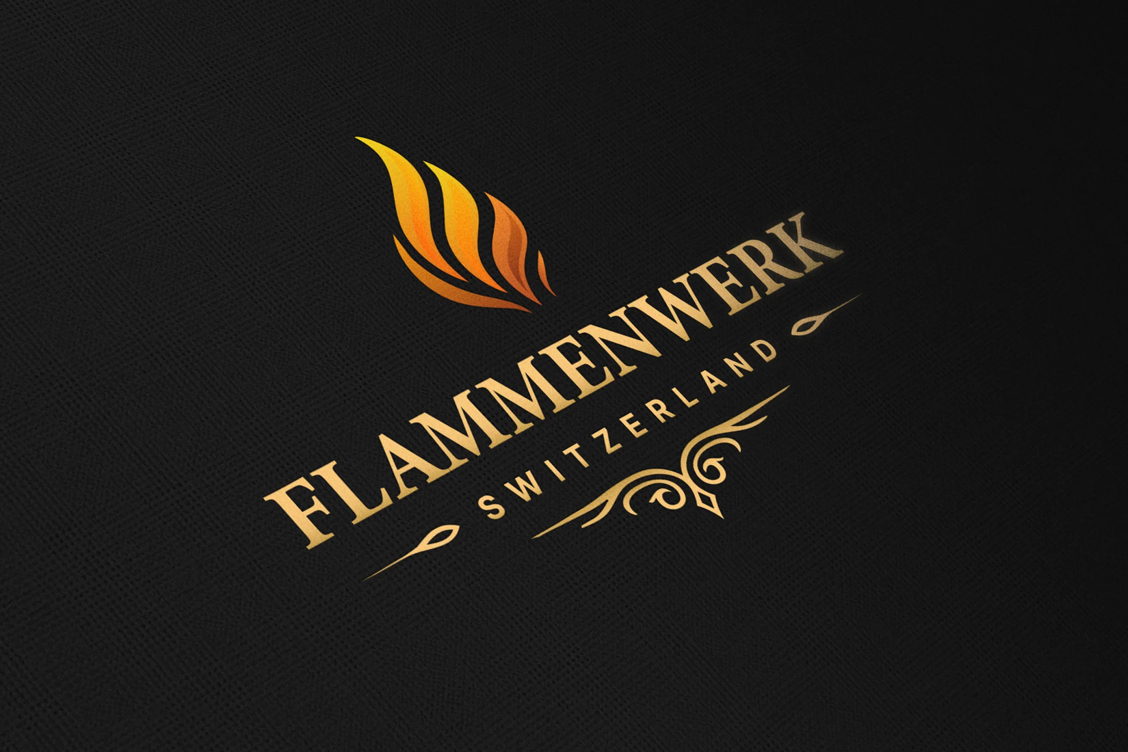 Flammenwerk Switzerland — gold foil logo application on a textured surface